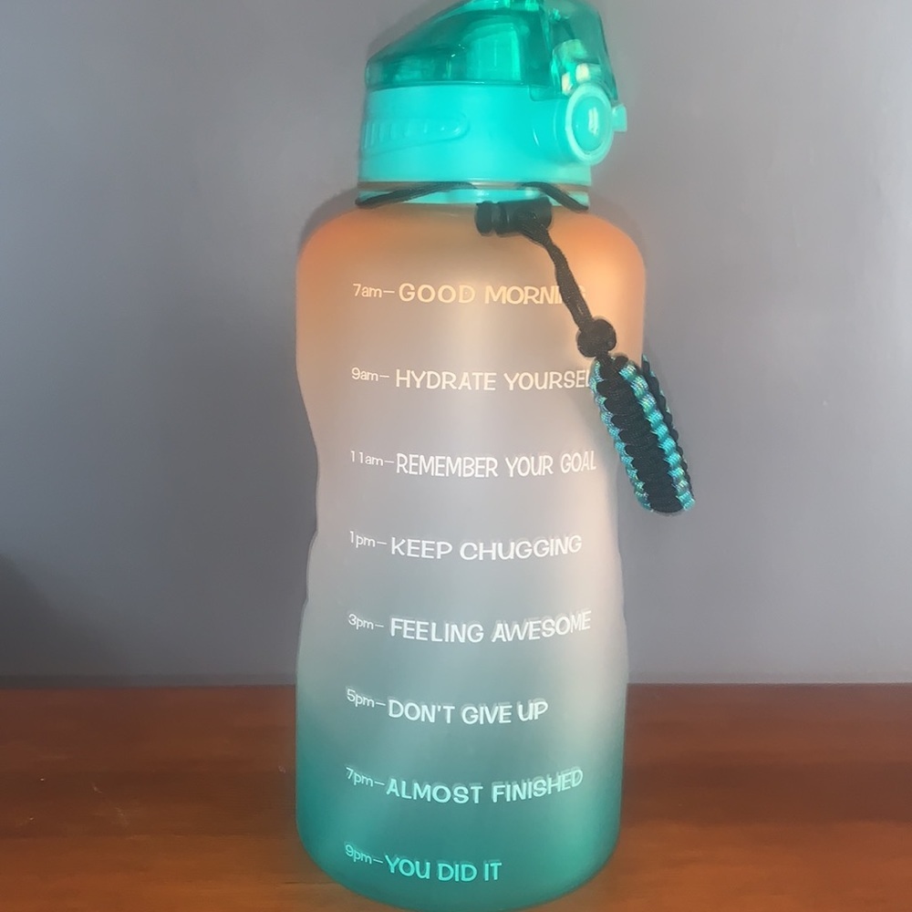 Giotto Large 128oz motivational water bottle.